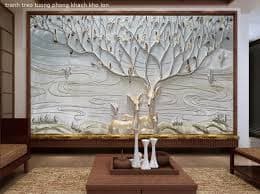 Sử dụng vít nở và móc treo chuyên dụng là cách treo khung tranh lớn lên tường phổ biến nhất.