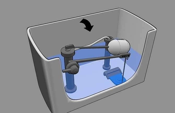 Thợ đang kiểm tra van cấp và phao nước bên trong két bồn cầu.