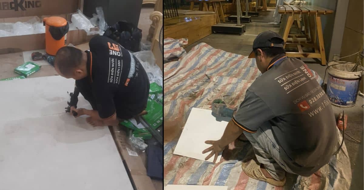 Thợ 1Fix đang thi công ốp lát gạch tường cho khu vực nhà tắm, đảm bảo độ phẳng và thẩm mỹ.